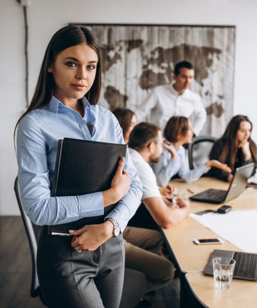 Group of people working out business plan in an office